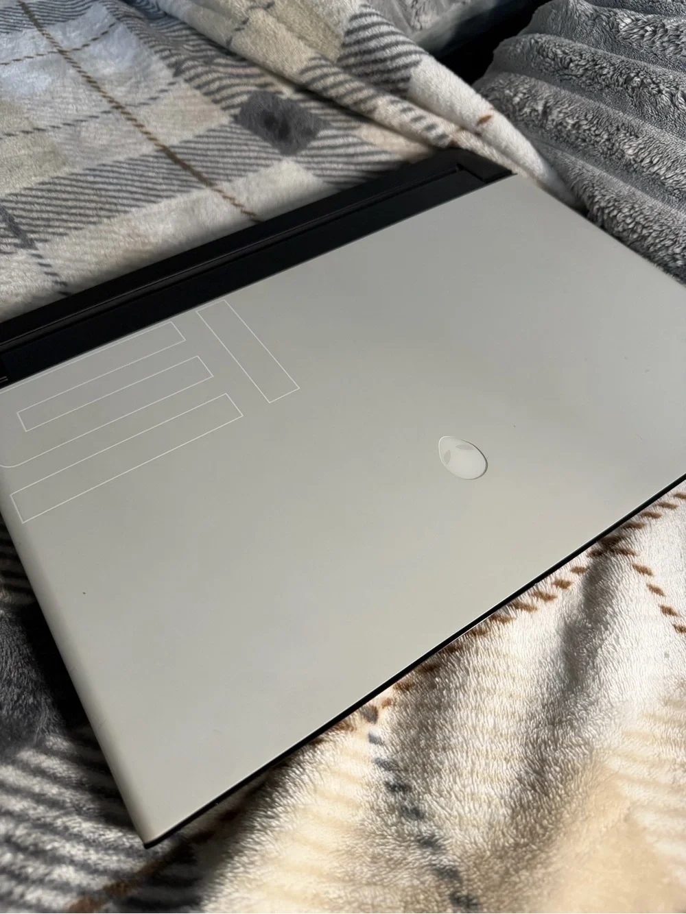 Alienware Silver-Gray Gaming Laptop with Subtle Logo